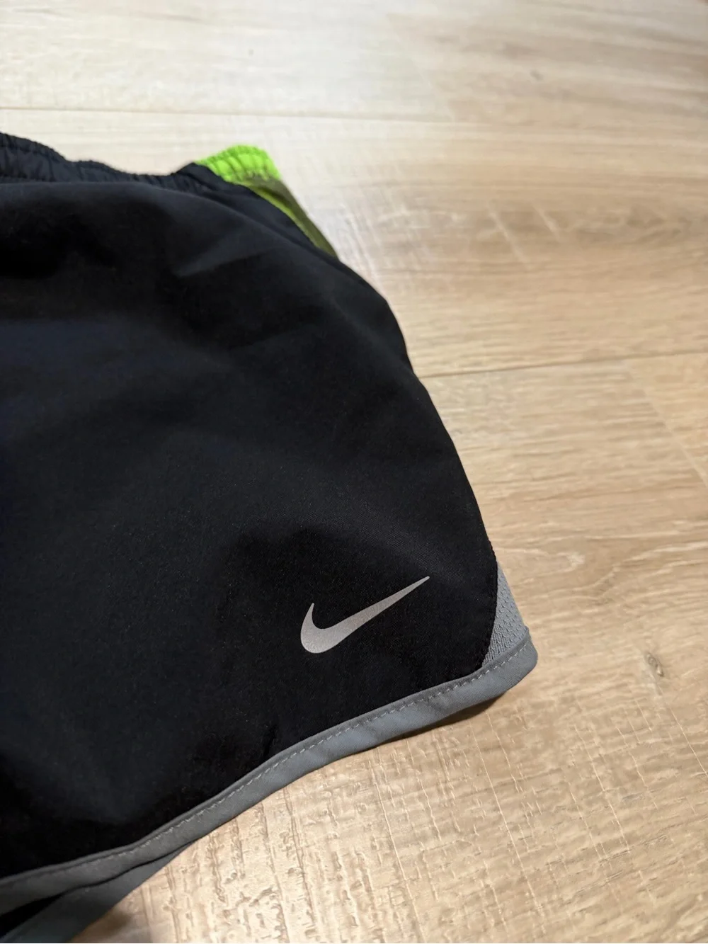 Nike woman’s Black & Green Running Shorts